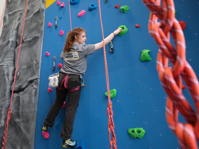 Ava Moorcroft tries out the new wall. picture: Richard Ponter