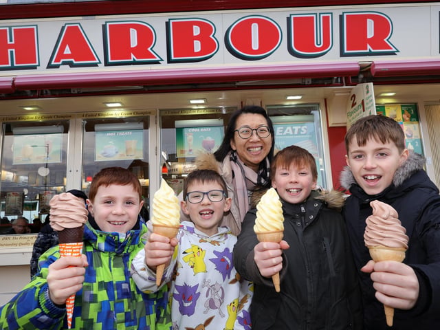 Family and friends enjoy an ice cream on Scarborough's South Bay