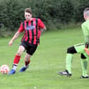 Ben Clark takes on Edgehill Res keeper Harrison McCausland.