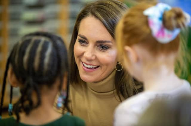 The Prince and Princess of Wales talk at nursery children at the Rainbow Centre in Scarborough.