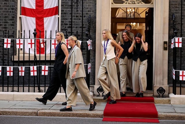 Members of the England women's football team, leave Downing Street after a reception at No 10 - Beth Mead is at the front with Alessia Russo. Photo by Dan Kitwood/Getty Images