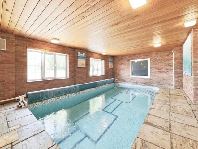 The property includes its own heated indoor swimming pool.