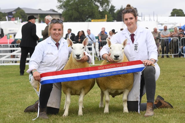 Mary and Annie Stones with their North Country Cheviot who were crowned Overall Pair of Lambs Supreme champions at the show