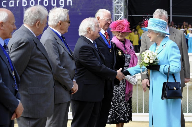The Queen shakes hands with Max Payne MBE, as she meets the Freemen of the Borough of Scarborough.
102037k