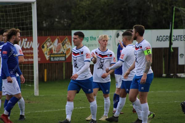 Max Howells celebrates one of his three goals in Whitby's 5-1 win at Matlock Town on Saturday. Photos from Owen Cox/Whitby Town FC