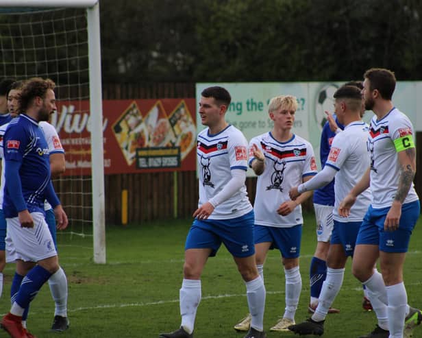 Max Howells celebrates one of his three goals in Whitby's 5-1 win at Matlock Town on Saturday. Photos from Owen Cox/Whitby Town FC