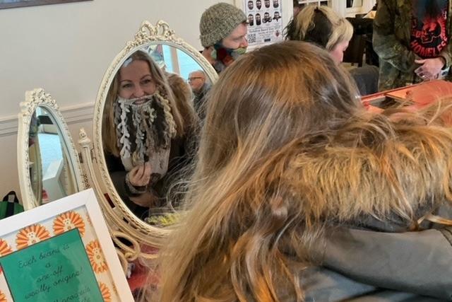 Checking the 'beard' in the mirror.