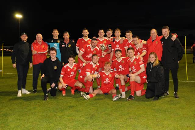 Bridlington Town celebrate their ERCFA Senior Cup final success against Hedon Rangers. PHOTO BY DOM TAYLOR