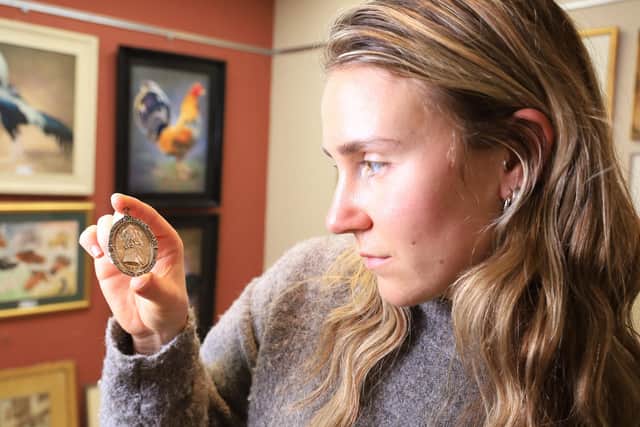 Ella Shaw with the Charles I medal.
