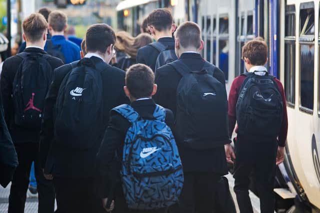 Youngsters community by rail.