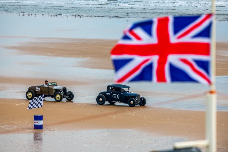 This years The Race the Waves Vintage Beach Race festival held on Bridlingon's south beach with over one hundred competitors taking part in the event from the early years of coastal motor racing to post-war American hot-rodders and drag racing culture. Picture By Yorkshire Post Photographer, James Hardisty. Date: 22nd April 2023.