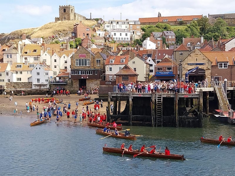 Crews head back to the beach after one of the early races on Sunday. picture: Duncan Atkins