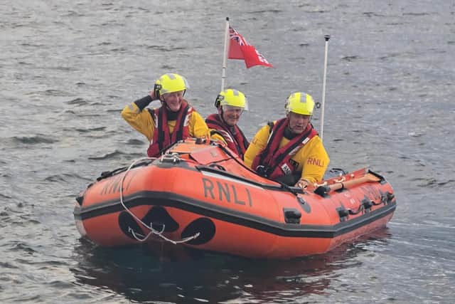 The inshore lifeboat arrives at the scene - Photo: RNLI/Neil Williamson