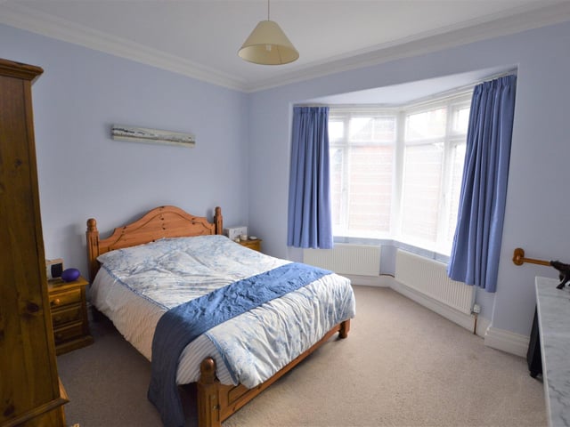 A double bedroom. All of the windows in this property are large, making the house bright and airy throughout.