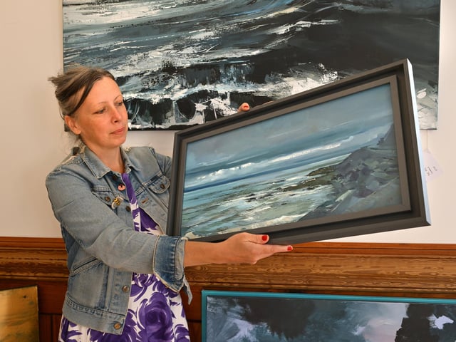 Artist Carolyn Coles with her work. photo: Richard Ponter