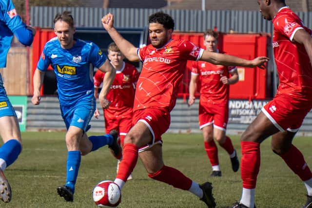Brid Town's Ahmed Salam at full stretch to reach the ball before a Newton Aycliffe rival. Photo by Lucy Sharpe