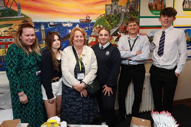 Staff, organisers and pupils enjoy the evening showing the Eskdale School memories exhibition, which is coming to Whitby Museum. Photo: Richard Ponter