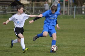 Heslerton Hedgehogs Under-14s (blue kit) earn League Cup 2-1 win against visitors Sleights Under-14s. PHOTOS BY CHERIE ALLARDICE