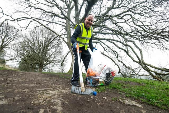 Malton and Norton Tidy Group volunteer, Nicholas Fletcher, litter-picking in his local park.