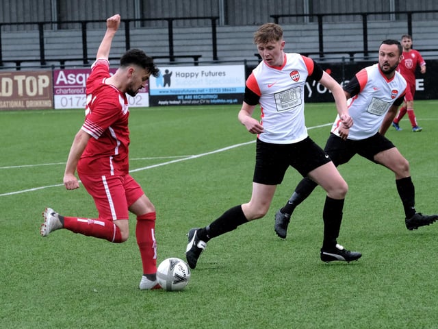 The visitors take a shot against Itis Itis Rovers