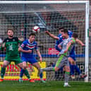 Ashley Jackson (far right number 3) scores 93rd minute winner for Gainsborough at Whitby. PHOTOS BY BRIAN MURFIELD