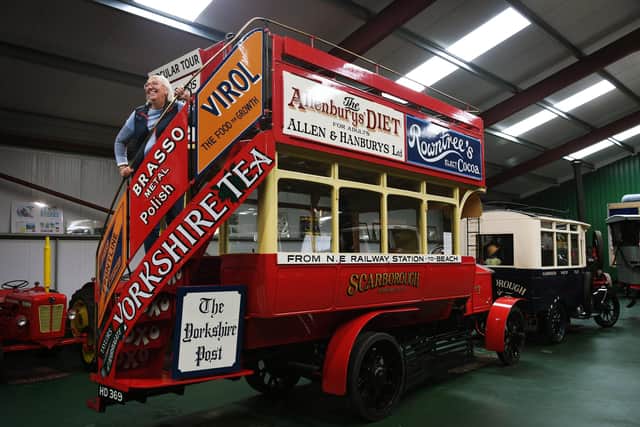 Manager Julie Kennedy and the 1916 Napier double decker bus.