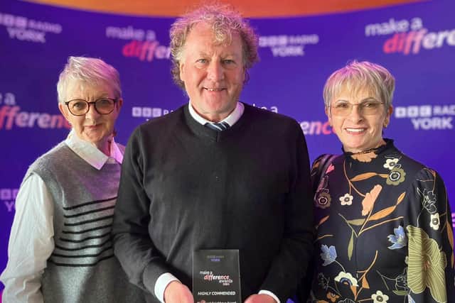 Mick Couzens with his award