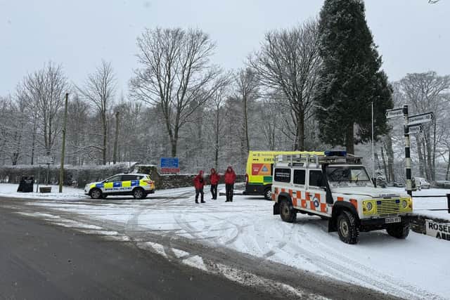 A multi-agency team worked to assist the occupant on the vehicle Image:SRMRT