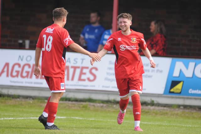 Local lad Billy Ripley congratulates fellow new signing Matty Bowman after his goal at home to Hallam.