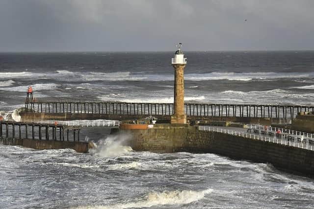Whitby's West Pier and Lighthouse take a battering in the the strong winter winds.
picture: Richard Ponter.