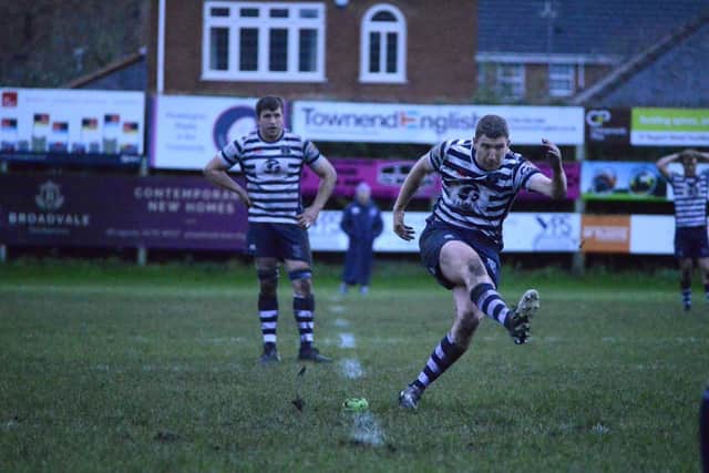 Christian Pollock kicks one of his two penalties to seal Pocklington RUFC's win at home to West Leeds. PHOTO BY ANDY NELSON
