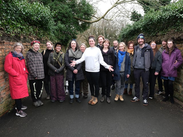 Sculptor Emma Smith (centre) at the unveiling of the trail