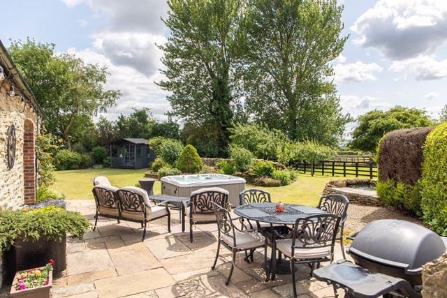 Beautiful gardens border open countryside.