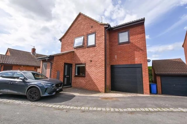 This four bedroom and two bathroom detached house is for sale with Henderson's Estate Agents with a guide price of £345,000.