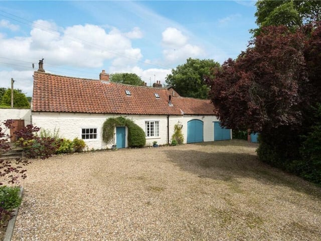 This two bedroom cottage that forms part of the property for sale is believed to predate the house.