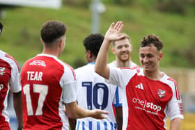 Cameron Wilson, right, celebrate a goal with Dom Tear. PHOTO BY MORGAN EXLEY