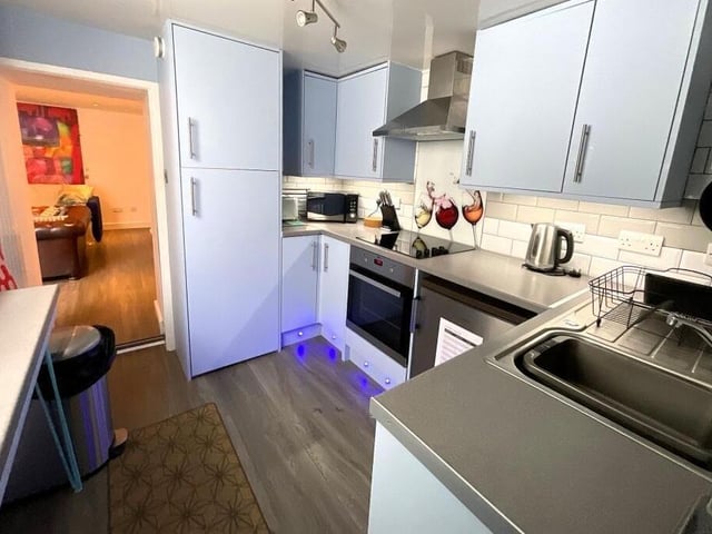 The smaller of two modern kitchens in the building.