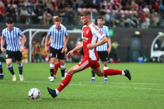 Boro debutant Luke Rees scores on his debut from the penalty sport to seal the 4-0 win. PHOTOS BY ZACH FORSTER