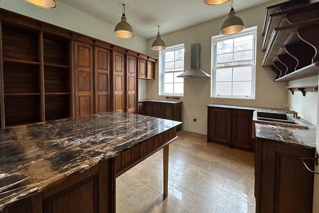Inside Chapel House: Church pews were converted in to units for use within the kitchen.