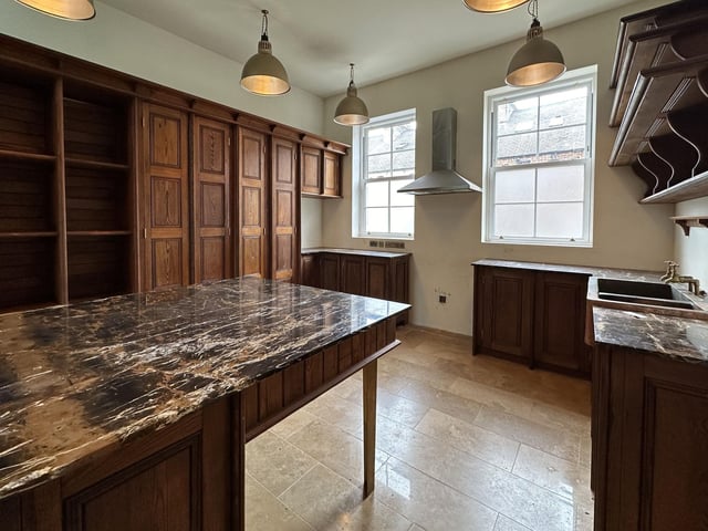 Inside Chapel House: Church pews were converted in to units for use within the kitchen.