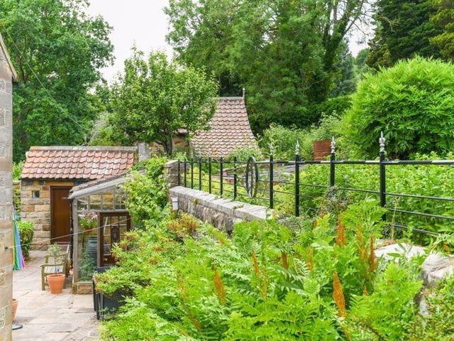 The property sits in some very impressive mature gardens and has an orchard, woodland, vegetable and grassed areas which amounts to 1.25 acres.