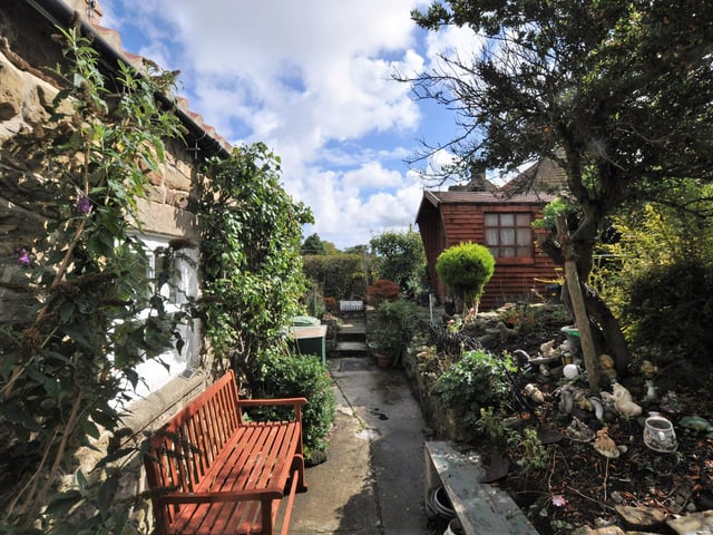 A space to sit in the pretty garden area.