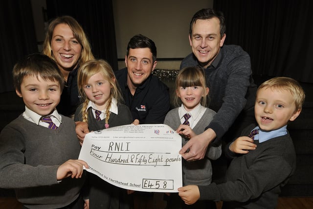 Pupils from Northstead Primary School present a cheque to Scarborough RNLI.