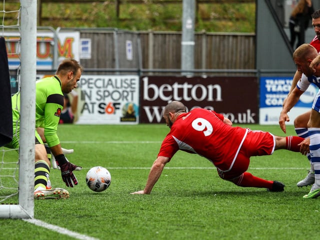 Frank Mulhern goes close to scoring.
