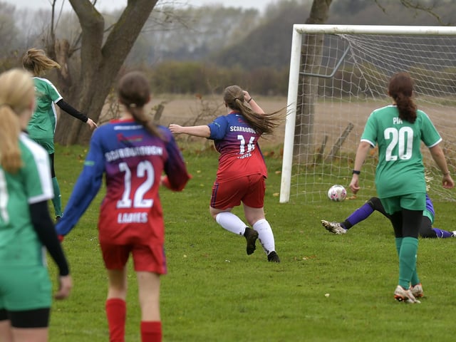 Striker Ellie-Mae Bloomfield celebrates doubling Scarborough Ladies U15s' lead