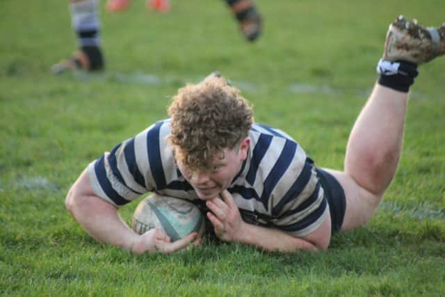 Will Husband scores the second of his three tries for Pocklington at Doncaster Phoenix. Photo by Phil Gilbank