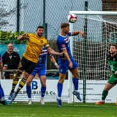 Whitby Town's Connor Simpson heads the ball clear during a 2-1 home win against Prescot Cables. Photos by Brian Murfield