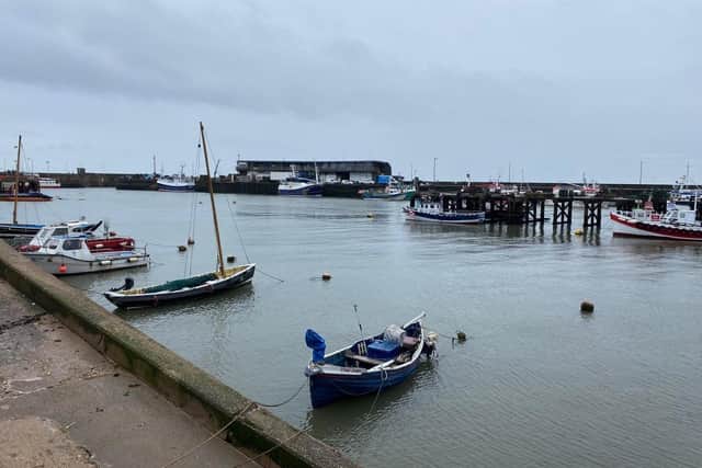 A serene harbour scene is captured by Ian Sandy.