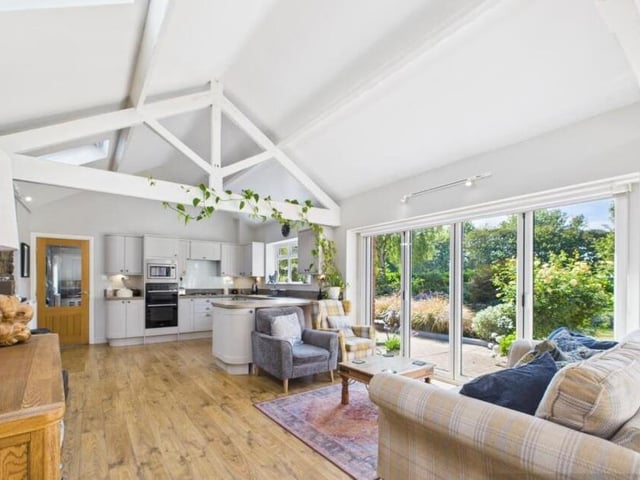 The open plan kitchen with dining and living area.