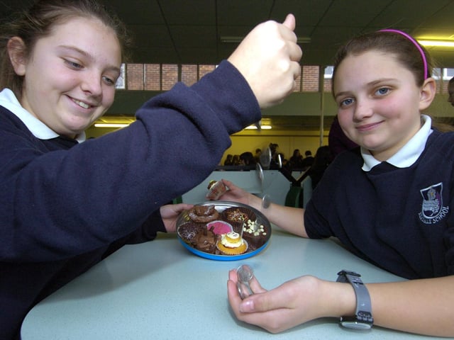 Evie Headlan (12) and Courtney Reid (12) organisers of the bun sale for Haiti at Eskdale School
w100304a